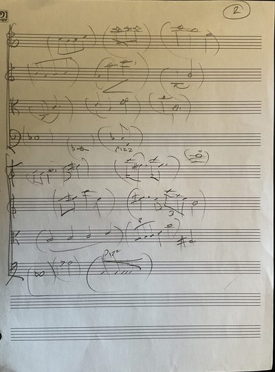 A handwritten pencil sketch of a score on manuscript paper